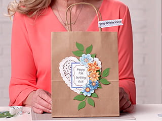 A personalised gift bag using printed labels created on the full colour Brother Design and Craft label printer
